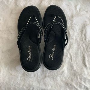 Black sketchers sandal